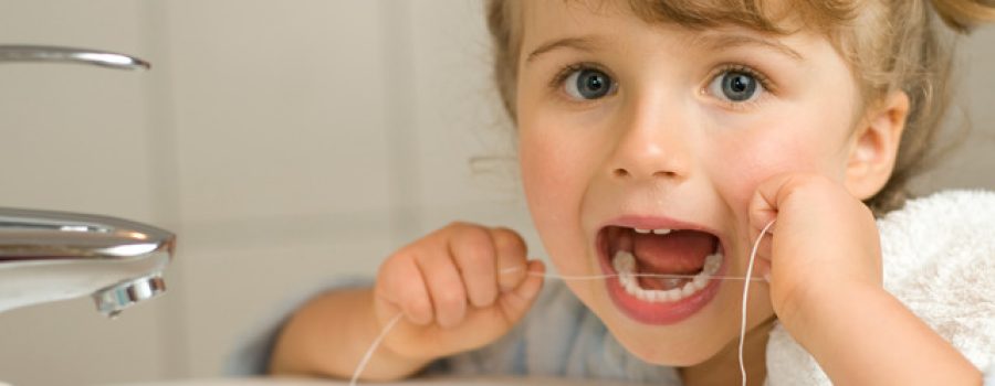 Child Flossing